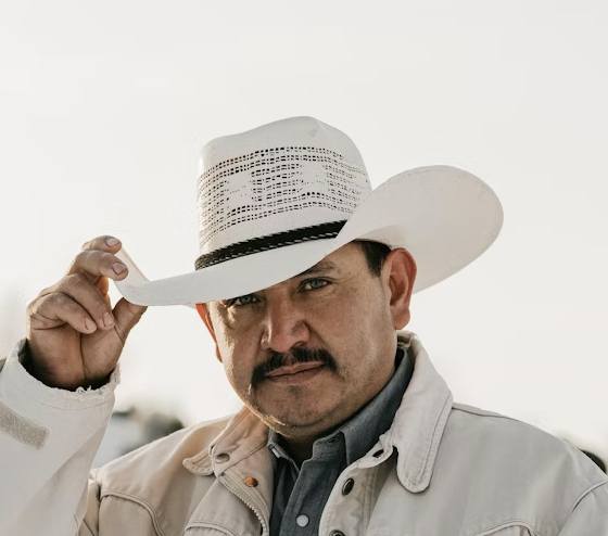mustache man in cowboy hat